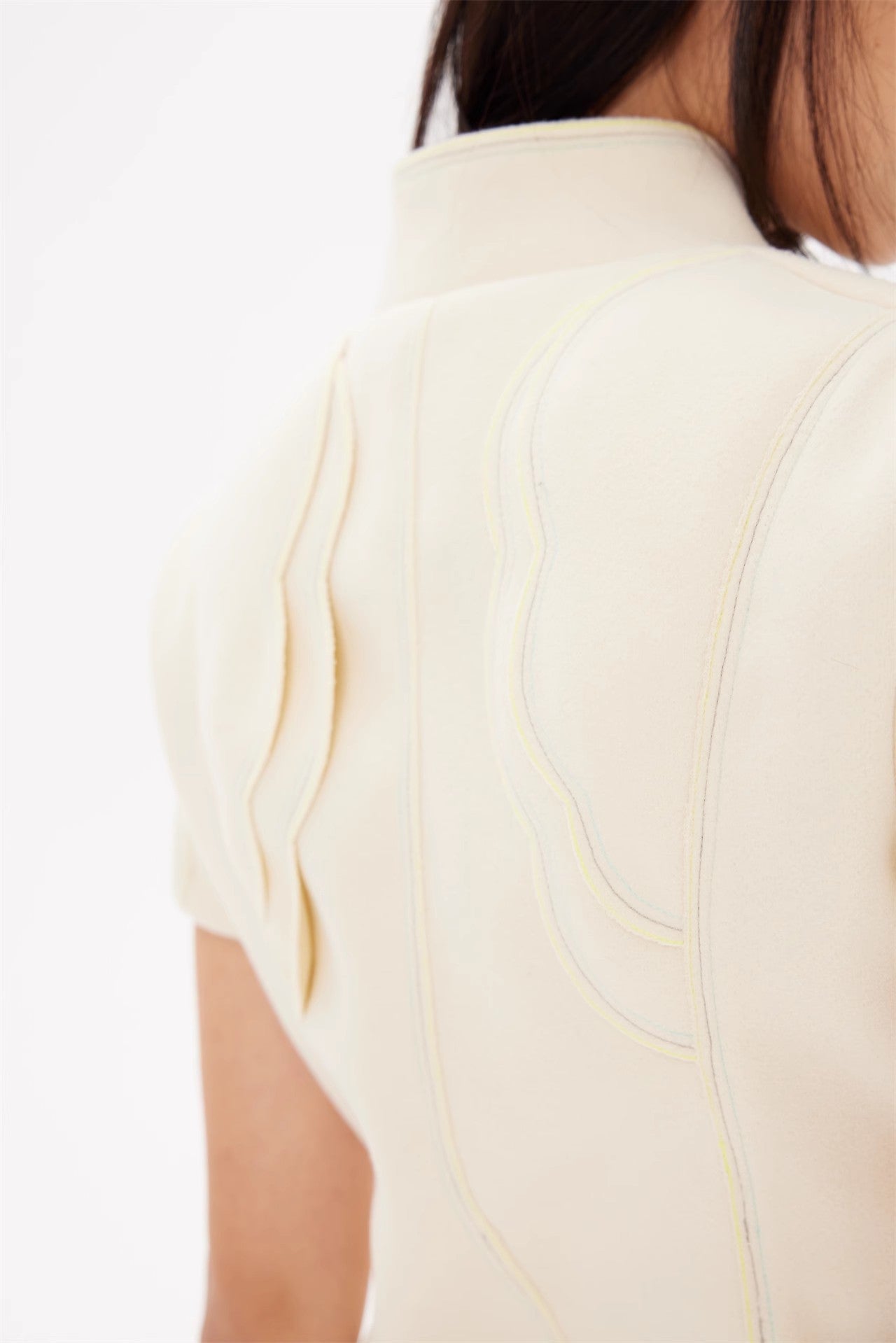 Wing flap woolen top