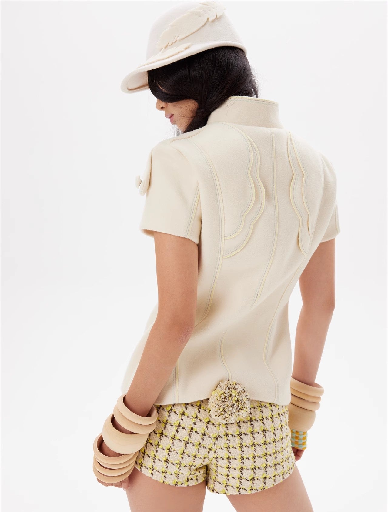 Wing flap woolen top